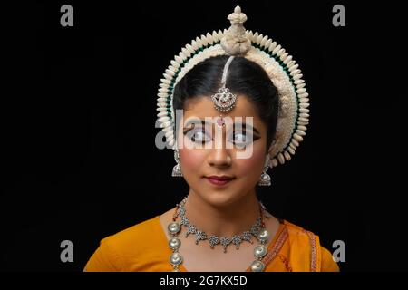 Odissi dancer striking a pose Stock Photo