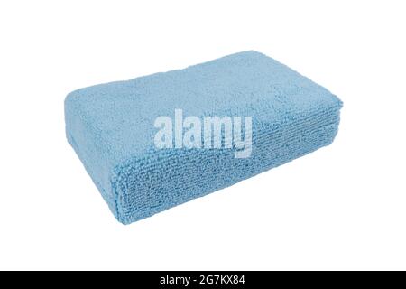Blue sponge for car washing isolated on white background. Sponge for cleaning car interior. Car detailing accessory. Stock Photo