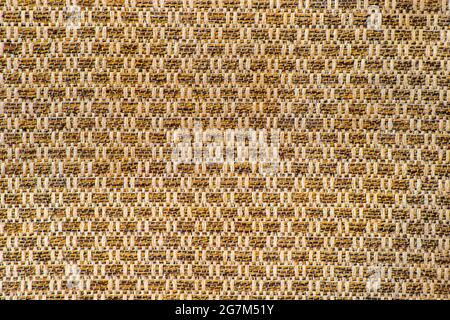Image of a fabric rough brown background with repeating patterns Stock Photo