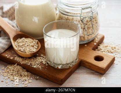 Vegan non dairy alternative milk. Oat flakes milk Stock Photo