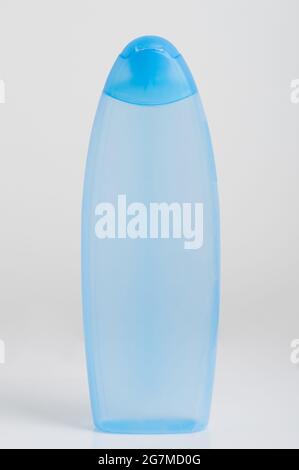 Empty clean blue plastic  container isolated on white studio background front view Stock Photo