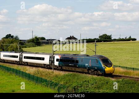 Avanti West Coast Pendolino electric train on the West Coast Main Line, Northamptonshire, England, UK Stock Photo