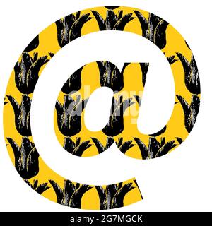At sign, mail sign of the alphabet made with a pattern of black tulip on a yellow background, isolated on a white background Stock Photo
