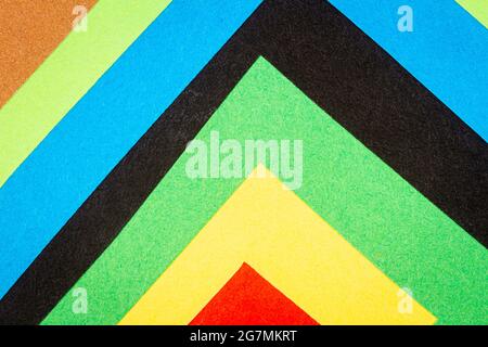Multicolor background from a paper of different colors. Abstract colorful vibrant paper textures. Stock Photo