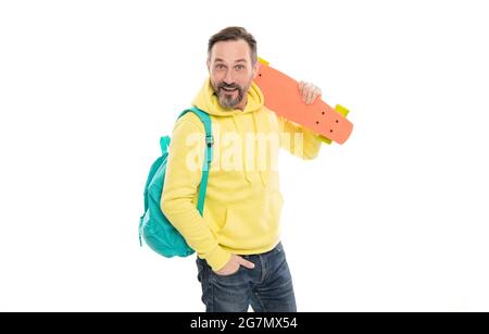 surprised man in yellow hoody with skateboard. adult skateboarder. male casual hipster style Stock Photo