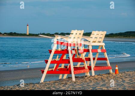 North Wildwood, United States. 15th July, 2021. Lifeguard stations rest on the beach before the start of the Beach Patrol's shift on a warm summer day Thursday, July 15, 2021 at in North Wildwood, New Jersey. Temperatures are expected in the 90's through the rest of this week. Credit: William Thomas Cain/Alamy Live News Stock Photo