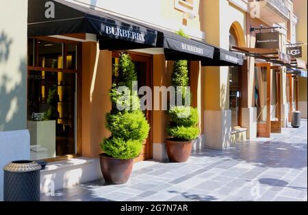 Burberry shop entrance with topiary bushes Las Rozas Madrid Spain Summer  Stock Photo - Alamy