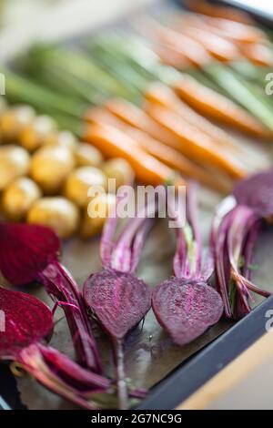 Fresh baked root vegetables Stock Photo