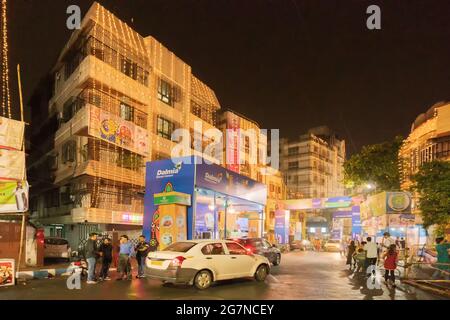 KOLKATA , INDIA - SEPTEMBER 28, 2017 : Night image of decorated Chakraberia road of Kolkata, shot at colored light, during Durga Puja festival. Durga Stock Photo
