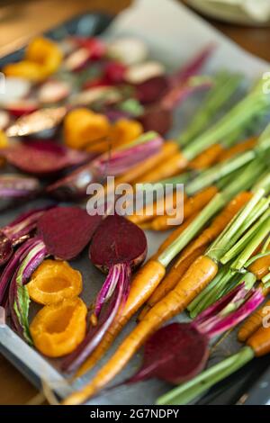 Fresh baked root vegetables Stock Photo