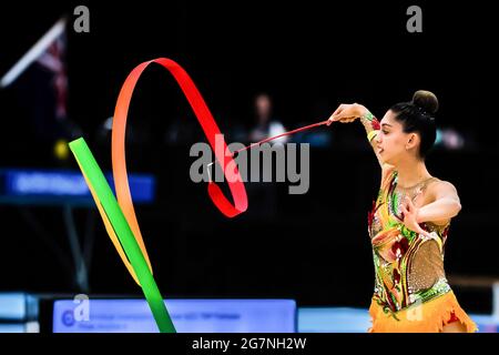 Gold Coast, Australia. 14th May, 2021. Australian Senior International Rhythmic Gymnast Ashari Gill shows off her ribbon skills at the Australian Gymnastics Championship 2021. Credit: SOPA Images Limited/Alamy Live News Stock Photo