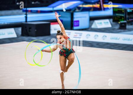 Gold Coast, Australia. 14th May, 2021. Australian Senior International Rhythmic Gymnast Alexandra Eadle makes spirals with her ribbon at the Australian Gymnastics Championships 2021. Credit: SOPA Images Limited/Alamy Live News Stock Photo