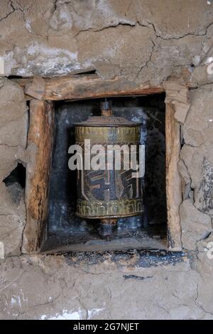 Prayer wheel in the village of Nako in Himachal Pradesh, India. Stock Photo