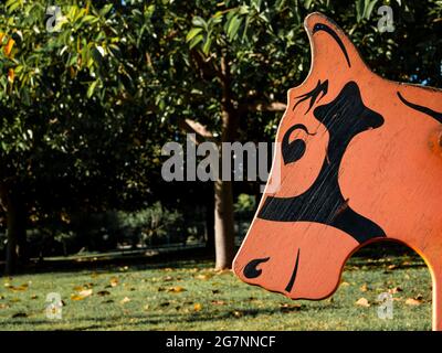 wooden head of a rocking horse in a children's playground Stock Photo