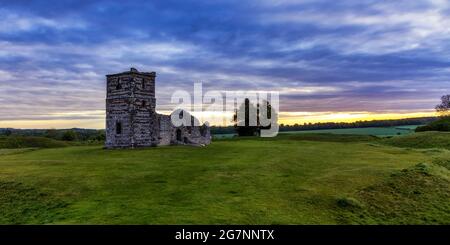 Knowlton Church and earthworks in East Dorset. The ruined medieval church is at the centre of a Neolithic ritual henge earthwork. Stock Photo