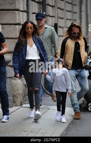 Milan, Zoe Saldana and Marco Perego at lunch in the center The American dancer and model actress ZOE SALDANA arrives in the center and goes to lunch with her husband MARCO PEREGO and one of the children. After eating at the 'Salumaio di Montenapoleone' they take a long walk through the streets of the quadrilateral before returning to the hotel, always escorted by a bodyguard. Stock Photo