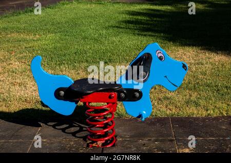 blue Swing dog toy seesaw for kids Stock Photo