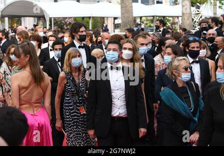 Cannes, France. 15th July, 2021. Crowds arriving at the France premiere, held at the Palais des Festival. Part of the 74th Cannes Film Festival. Credit: Doug Peters/Alamy Live News Stock Photo