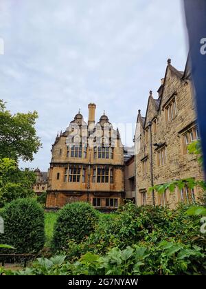 Front view of the Trinity College Oxford, England under lockdown during Covid-19. Trinity College is located within the heart of the City of Oxford. Its spacious site, with exceptionally beautiful gardens and buildings, provides an ideal setting for graduate study. It is one of the constituent colleges of the University of Oxford in England. The college was founded in 1555 by Sir Thomas Pope, on land previously occupied by Durham College, home to Benedictine monks from Durham Cathedral. United Kingdom. Stock Photo