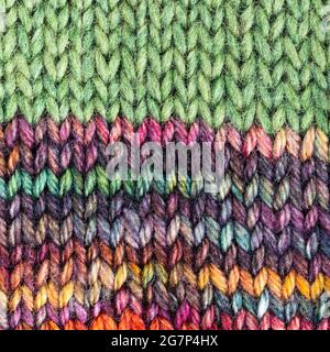 textile square background - texture of hand-knitted woolen cloth close up Stock Photo