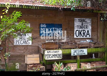 Roadside farmers market with rustic, quaint signs. Stock Photo