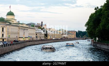 Cruise pleasure boats on Fontanka river, near Summer Garden, St. Petersburg, Russia Stock Photo