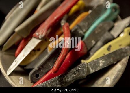 Bronze casting process and manual labor concept. Stock Photo