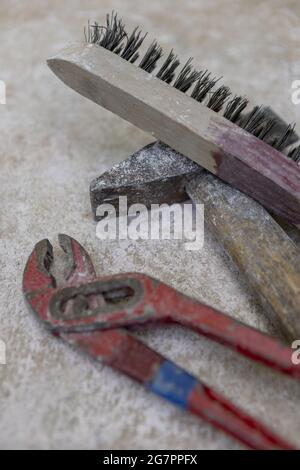 Bronze casting process and manual labor concept. Stock Photo