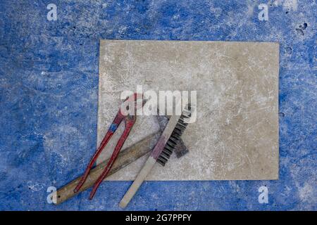 Bronze casting process and manual labor concept. Stock Photo