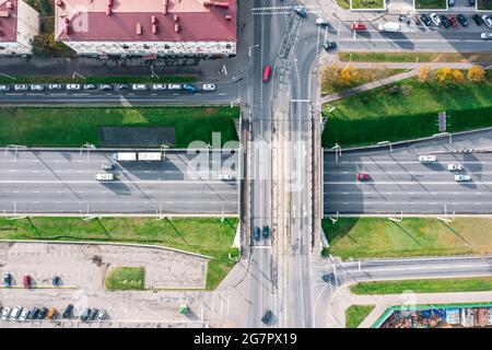 urban road intersection with traffic bridge. city infrastructure from above. aerial photo. Stock Photo