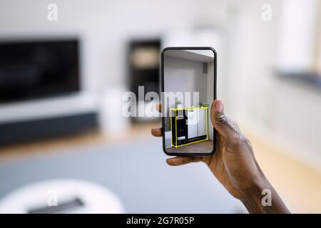 AR Mobile Phone Furniture Measurement App And Virtual Meter Stock Photo