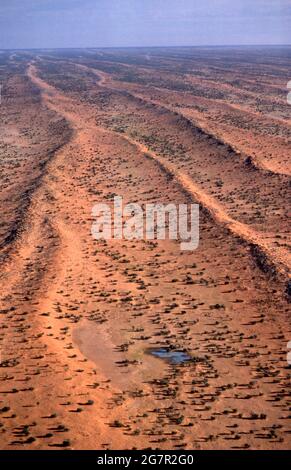 AERIAL OF THE PARALLEL SAND DUNES OF THE SIMPSON DESERT, CENTRAL AUSTRALIA. Stock Photo