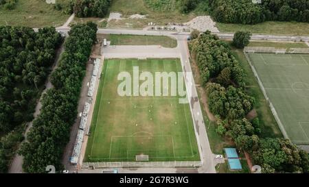 Areal view on football pitch in the forest. Football concept Stock Photo