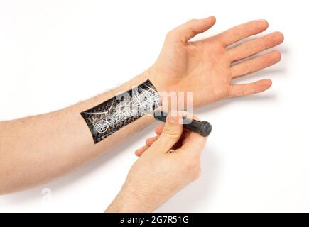 Robot hand inside human hand - Prosthesis concept, repairing, isolated on white Stock Photo