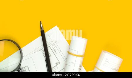 Architect design concept. Workspace with sketch plans and blueprints. Copy space and top view Stock Photo