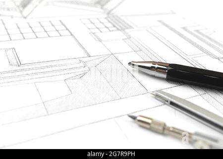 Working in office with blueprints, workplace with architectural plan and paper blueprints. Construction project concept Stock Photo