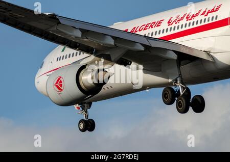 Air Algerie is the national airline of Algeria. This Airbus A330 is landing at London Heathrow Airport, UK. Airliner jet plane 7T-VJV on approach Stock Photo