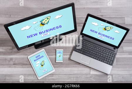 New business concept shown on different information technology devices Stock Photo