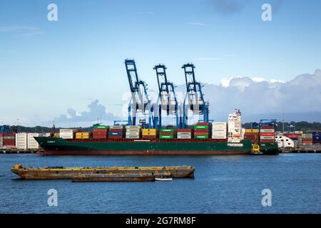 Allegro N Container Cargo Ship In Port At Panama City Republic Of Panama Against A Background Of Container Cranes Stock Photo