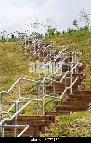 New stainless steel handrails on steps Stock Photo