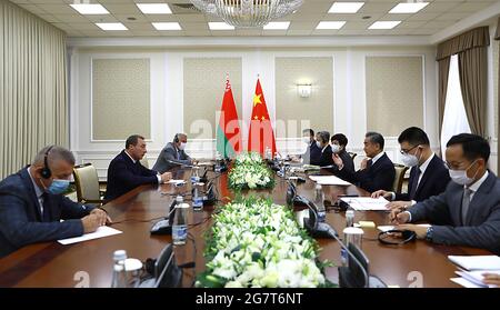 (210716) -- TASHKENT, July 16, 2021 (Xinhua) -- Chinese State Councilor and Foreign Minister Wang Yi (3rd, R) meets with first deputy prime minister of Belarus Nikolai Snopkov (2nd, L) in Tashkent, Uzbekistan, July 15, 2021. (Xinhua/Cai Guodong) Stock Photo