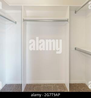 Square frame Empty walk in closet interior with small window carpet ...