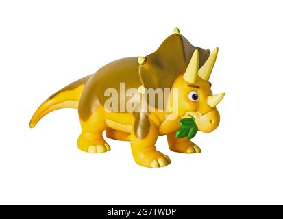 Plastic orange dinosaur toy, Triceratops isolated on white background Stock Photo