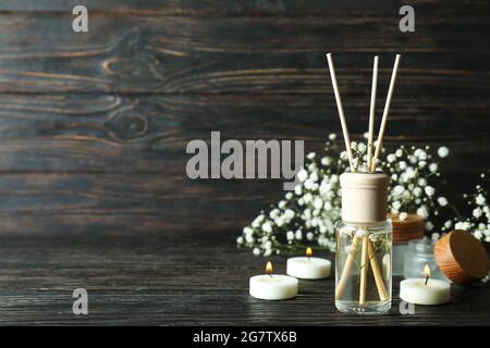 Aromatic concept with diffuser on wooden table Stock Photo
