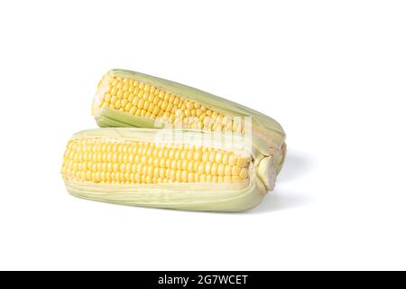 Two  realistic looking corn ears with leafs isolated white background Stock Photo