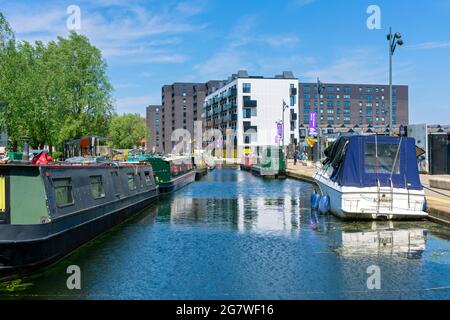 The Cotton Field Wharf and Mansion House apartment blocks, from the Cotton Field Park marina, New Islington, Ancoats, Manchester, England, UK Stock Photo