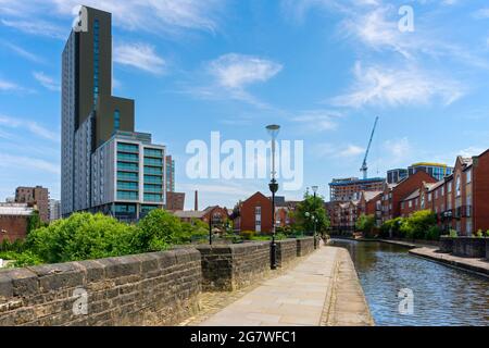 The Oxygen Tower apartment block from the Ashton Canal aqueduct, Manchester, England, UK Stock Photo