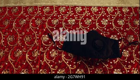 Closeup shot of a protective cloth mask on a decorative surface Stock Photo