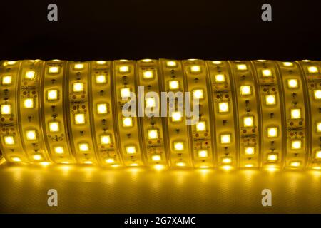 coil of LED strip warm light for home lighting. Stock Photo