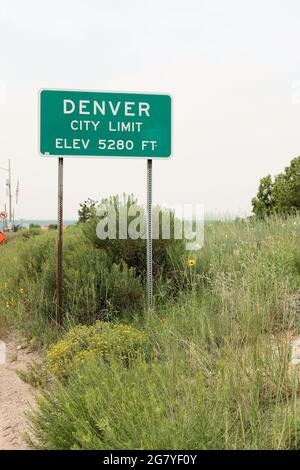 City limit street sign where Aurora, Colorado meets Denver informing visitors of the Mile High City's 5280 foot elevation, one mile above sea level. Stock Photo